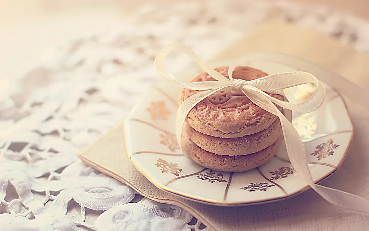 Butter biscuits on a plate, tied with a ribbon